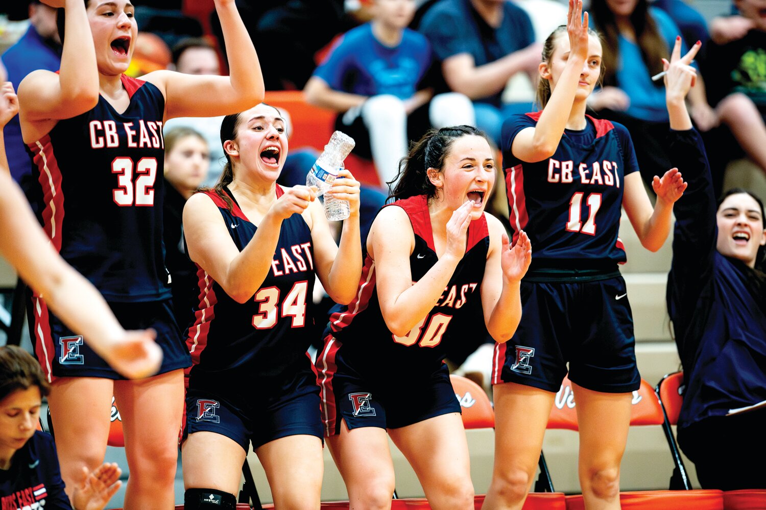 Despite being down late in the fourth quarter, the starters cheer on the subs during the 54-25 loss.