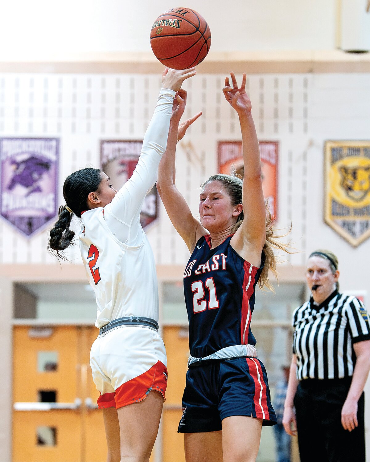 Central Bucks East’s Natalie Berndt has her pass attempt blocked by Perkiomen Valley’s Bella Bacani during the first quarter.