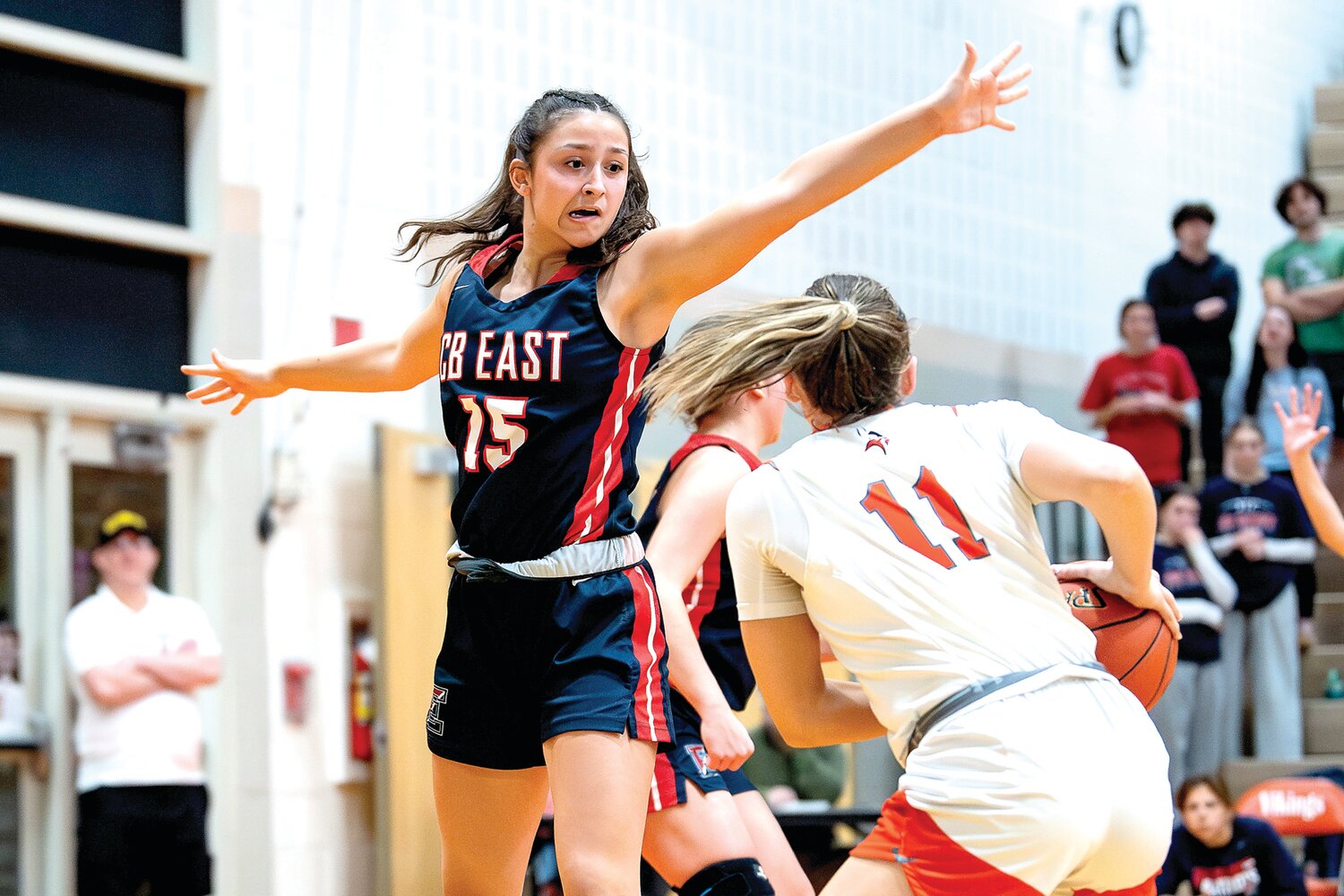 Central Bucks East’s Emma Penecale stretches out to block a pass of Perkiomen Valley’s Lena Stein.