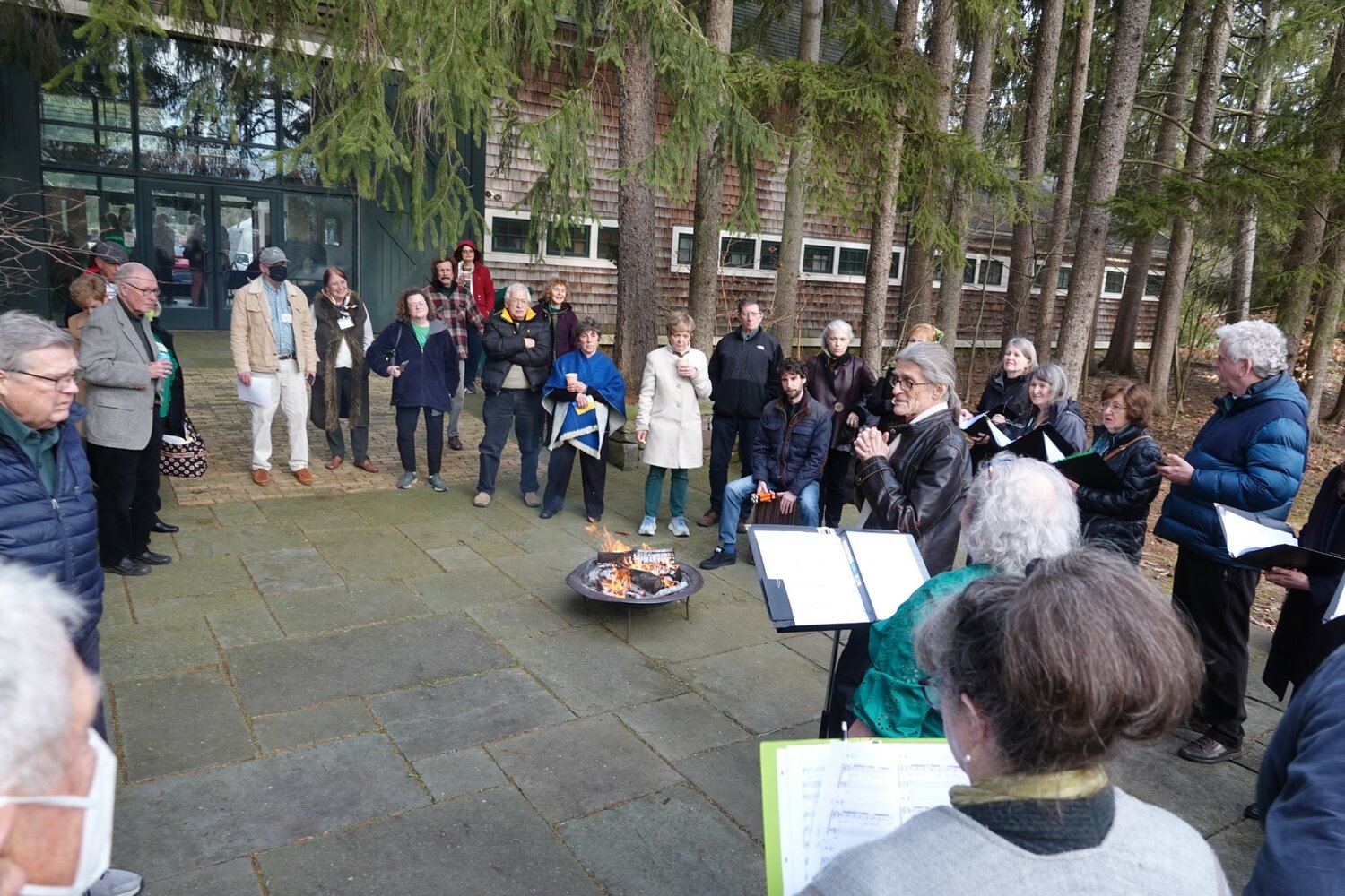 Guests gather around the fire pit last year for an Irish singalong.