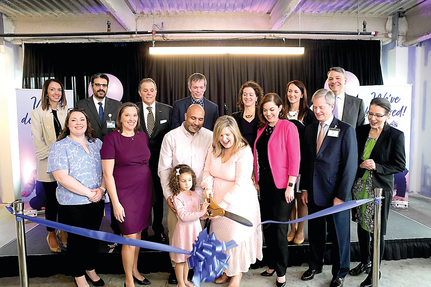 From left are: back row, Jessika Haynos, Fadel Balawi, Richard Anderson, Bill Moyer, Elizabeth Dierking, Nicole Nye, Israel Zighelboim; front row, Allison Blackburn, Betsy Schmeltzle, Peter Sawin, Emelia Milano-Sawin, Kristin Milano, Keri Angelozzi, Joel Fagerstrom and Jennifer Janco. Milano’s daughter was born at the Allentown Campus in 2018, and she will deliver her second child there in May.