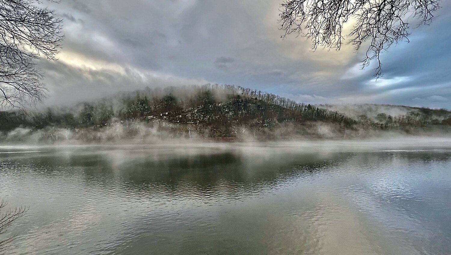 Shrouded in mist, the Devil’s Tea Table in Hunterdon County looms over the Delaware River. The rock formation is located along a three-mile stretch of Route 29 where the New Jersey Department of Transportation wants to initiate a rockfall mitigation project that critics say could hurt tourism and impact the water quality of the Delaware.