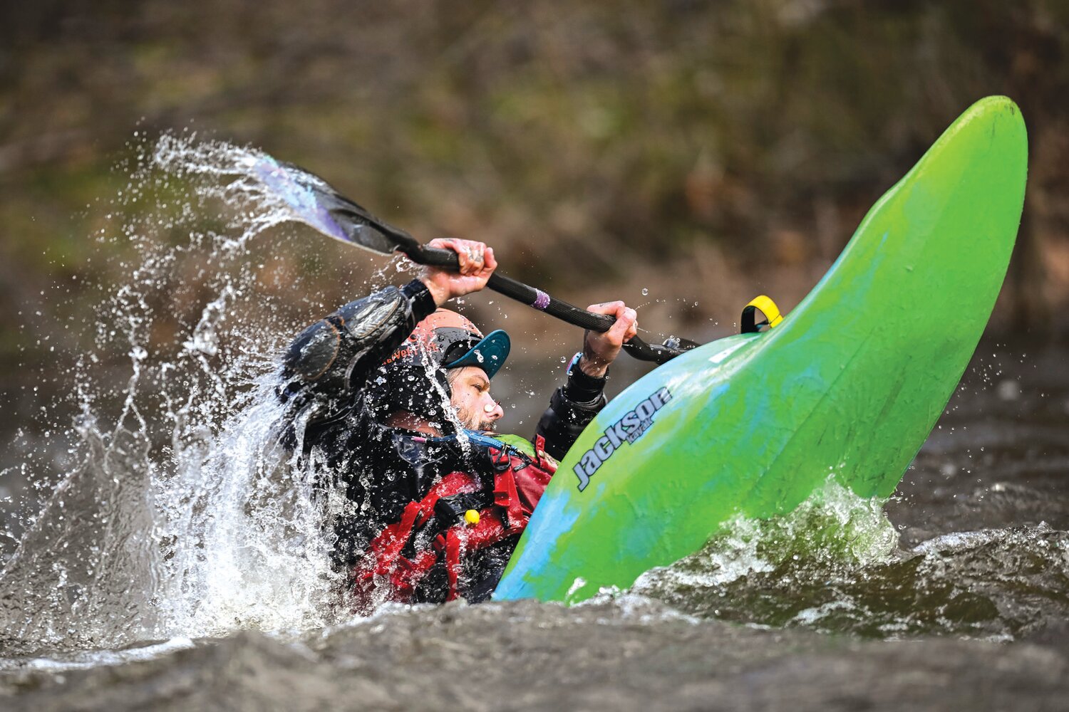 A kayaker navigates the Tohickon Creek following the water release from Lake Nockamixon on Saturday.