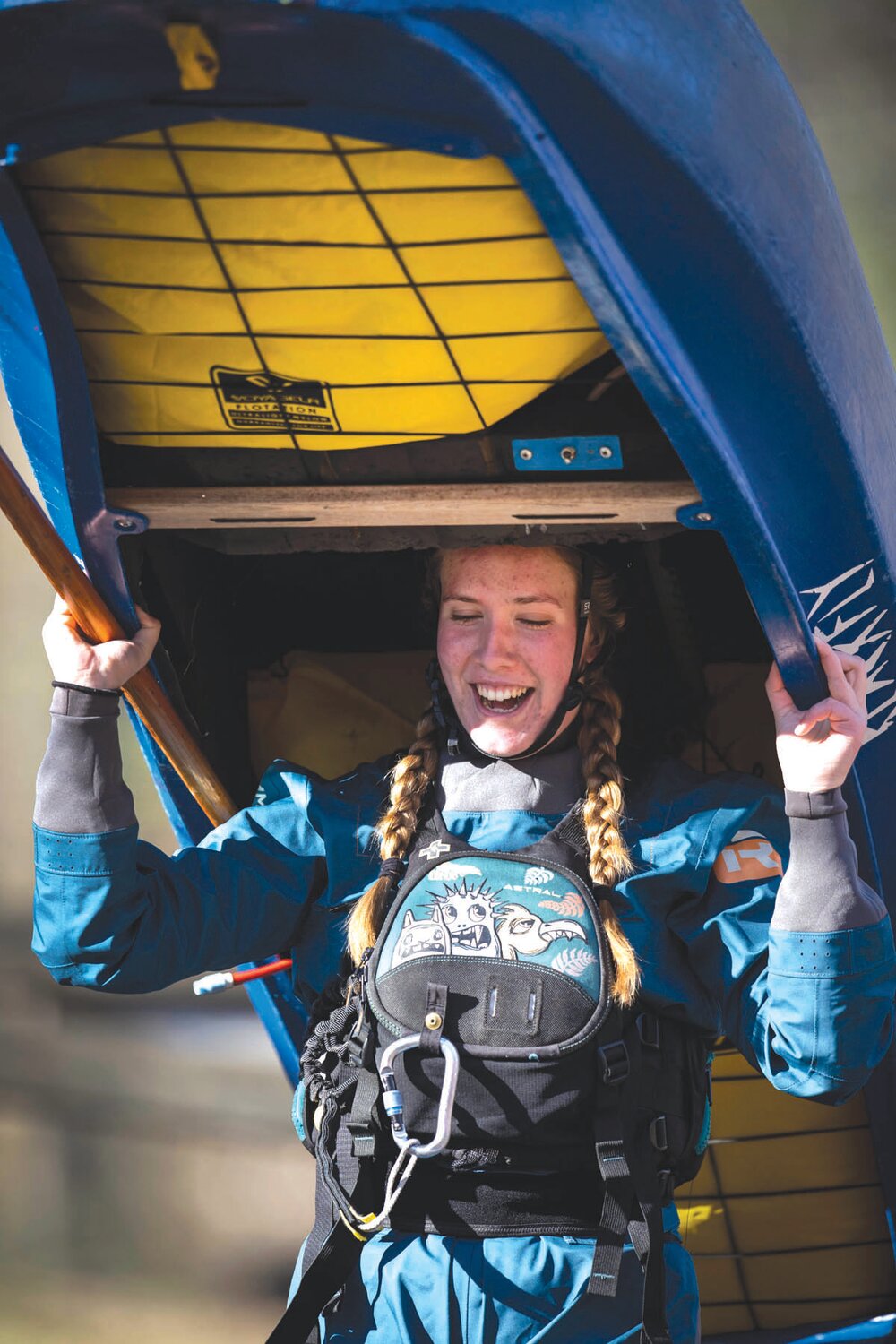 Anna Bellows, originally from Boston and now living in Philadelphia, carries her kayak.