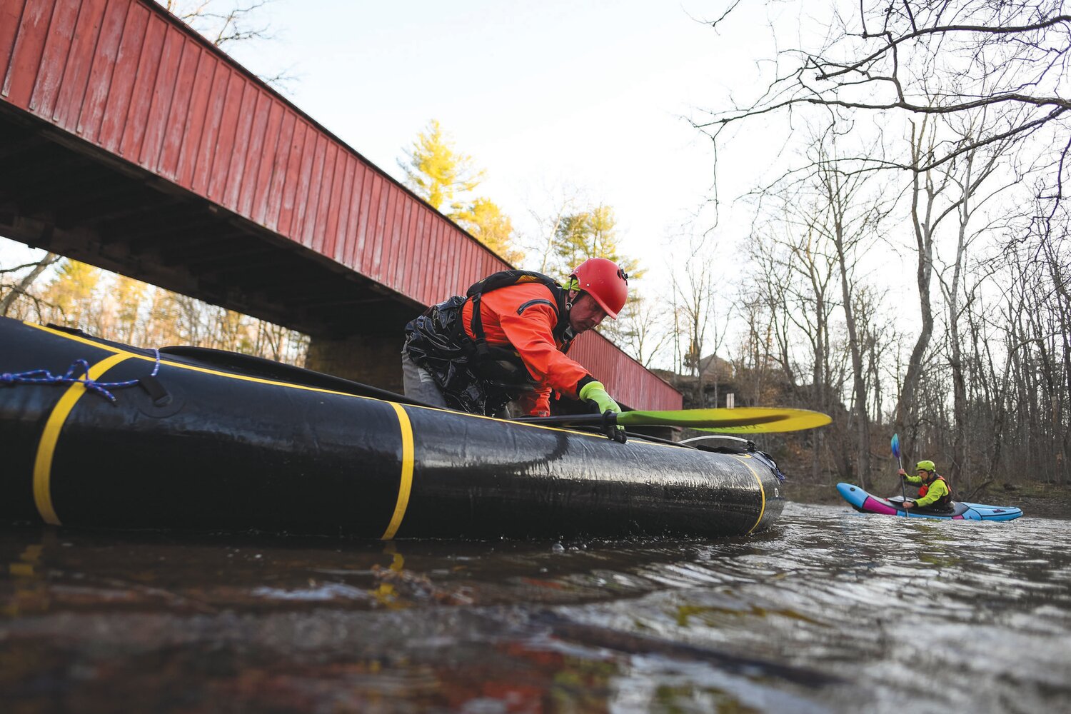 Second on the water Saturday behind Eric Caravella, Brian Gatens readies his inflatable raft.