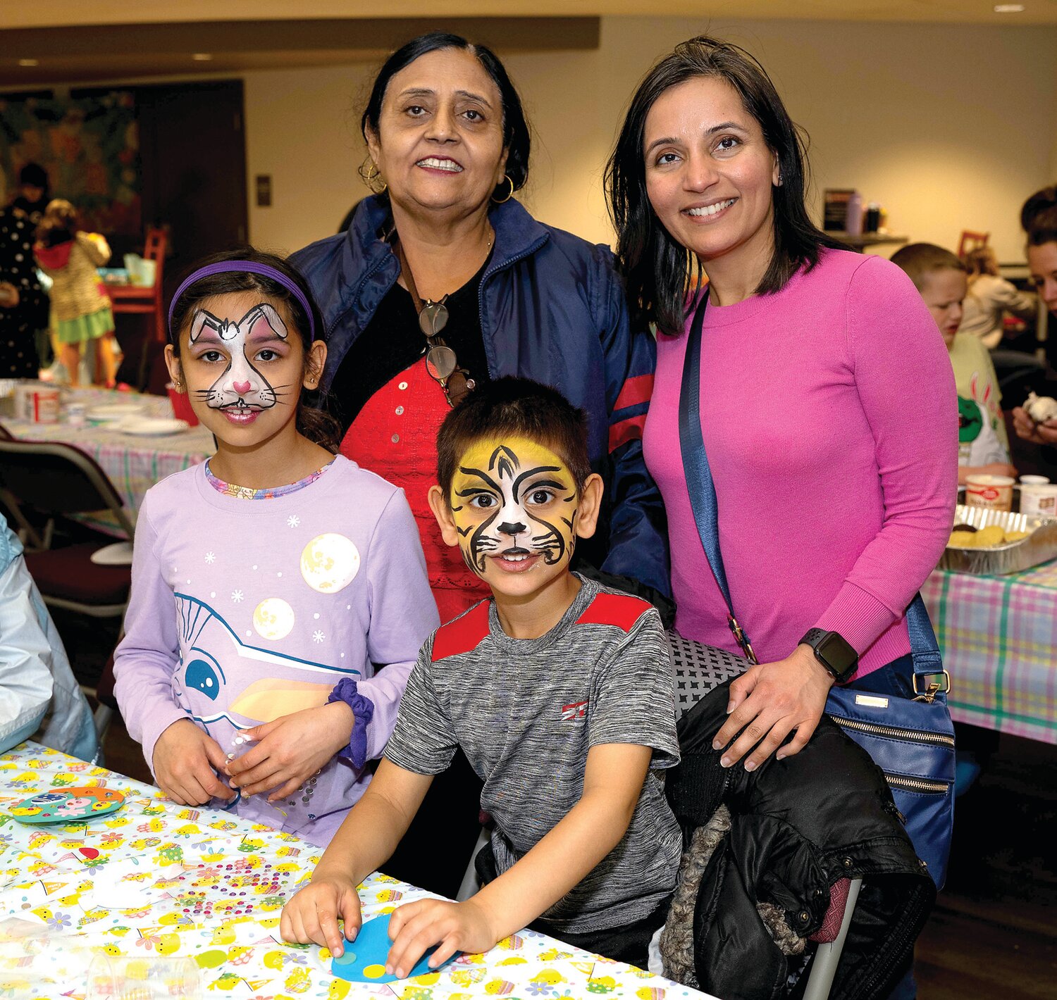 From left, Naya Shah, grandmother Sunita Dhawan, Navan Shah and mother Neeta Shah.