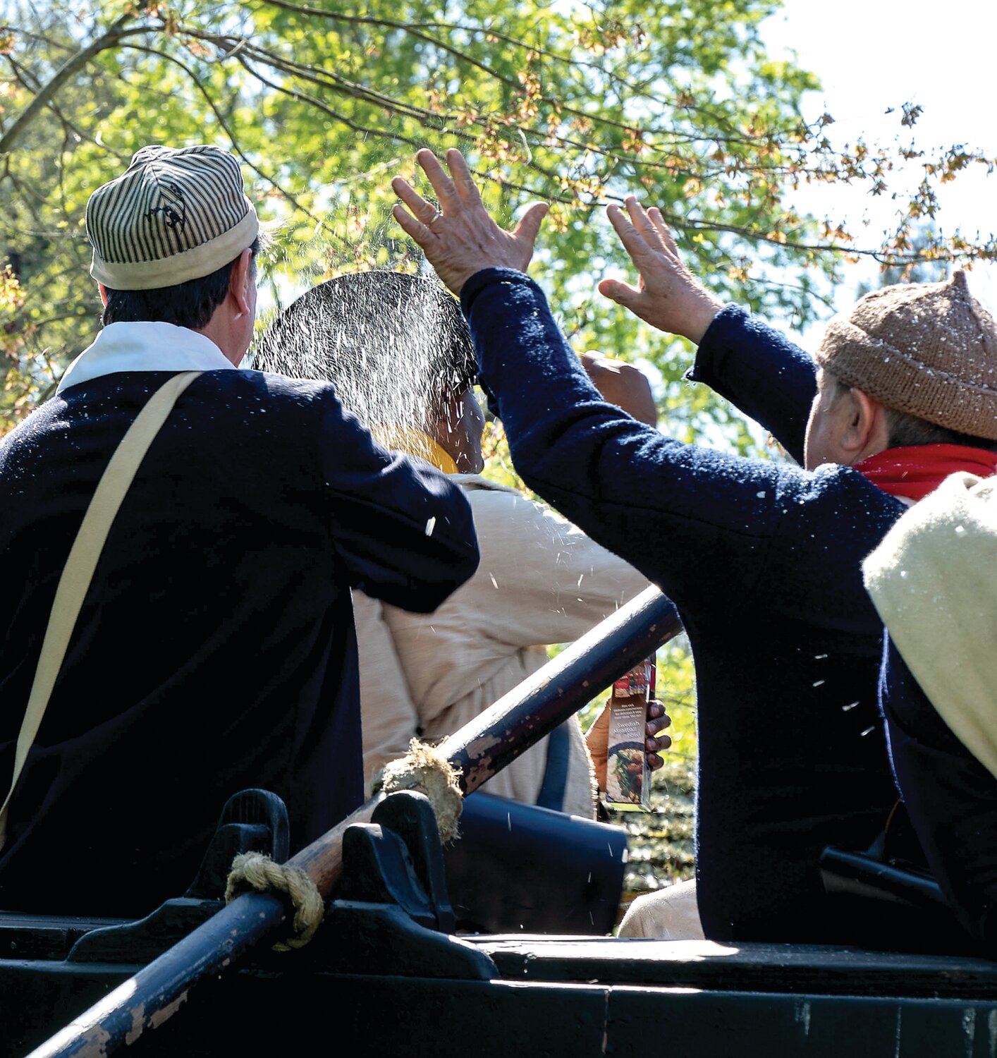 Reenactors sprinkle “snow” — actually instant mashed potato mix — on each other between takes.