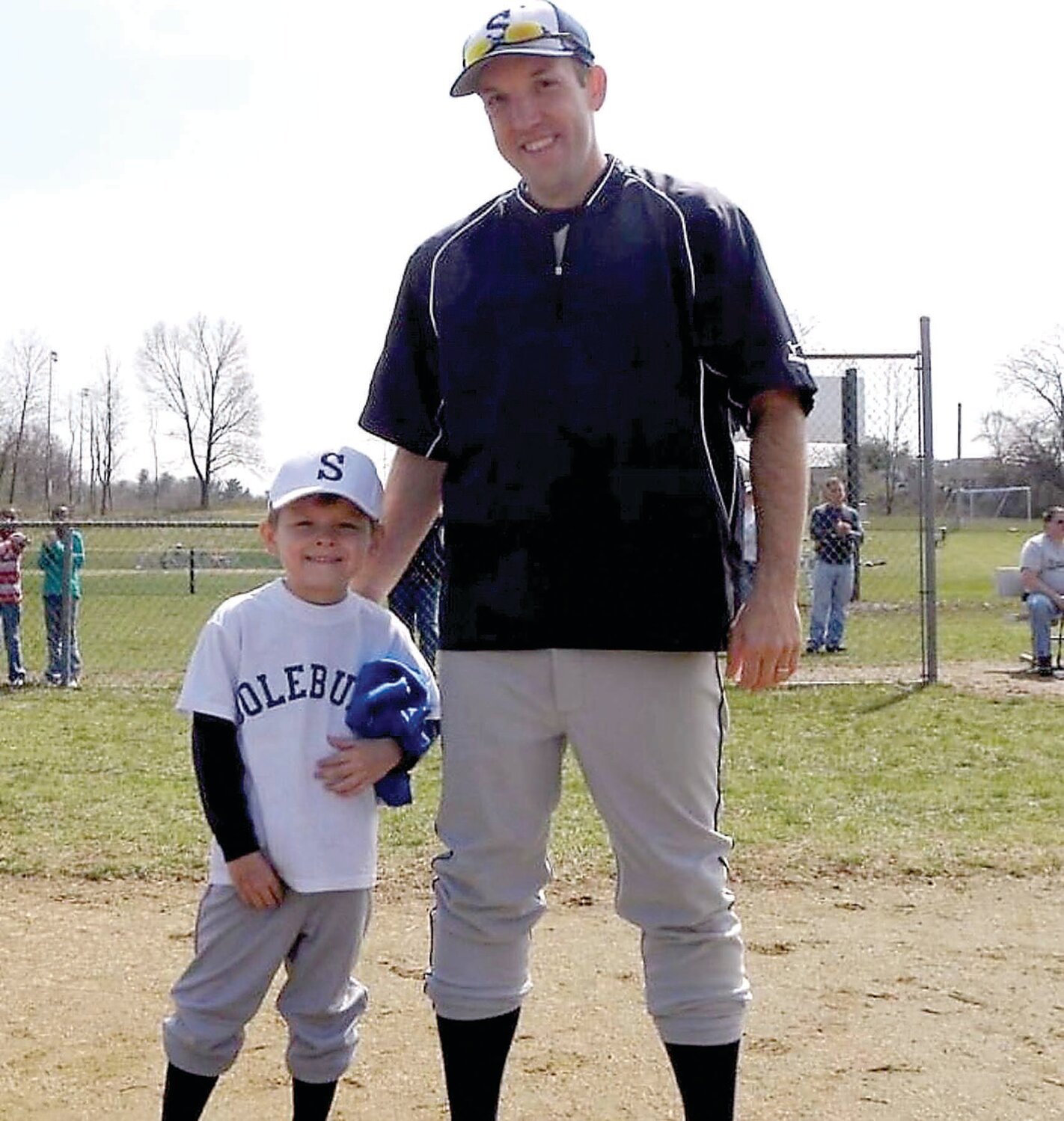 A young Ryan Eichem with his father, Rob Eichem.