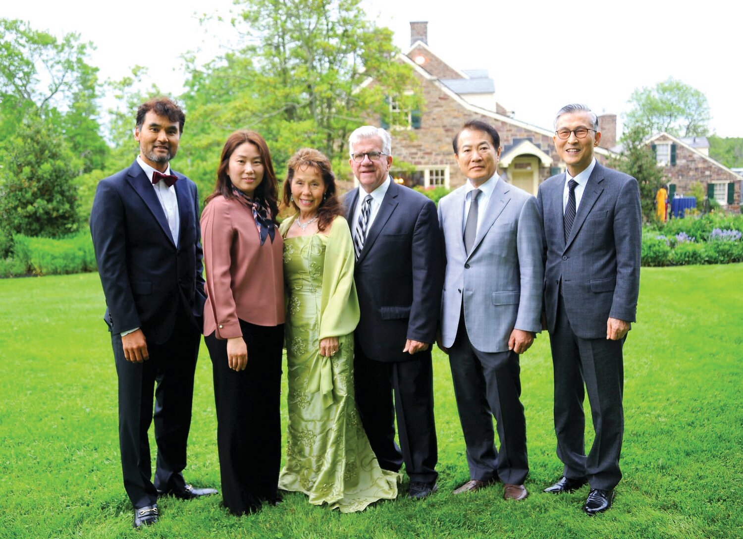 Chan-ho Park, board director of Pearl S. Buck Foundation Korea (PSBFK); Eun-yeong Baek, general manager of PSBFK; Julie Henning, daughter raised by Pearl S. Buck; Douglas Henning, husband of Julie and pastor; Seung-hoon Lee, board director of PSBFK; and Taek-myung Kwon, executive director of PSBFK.