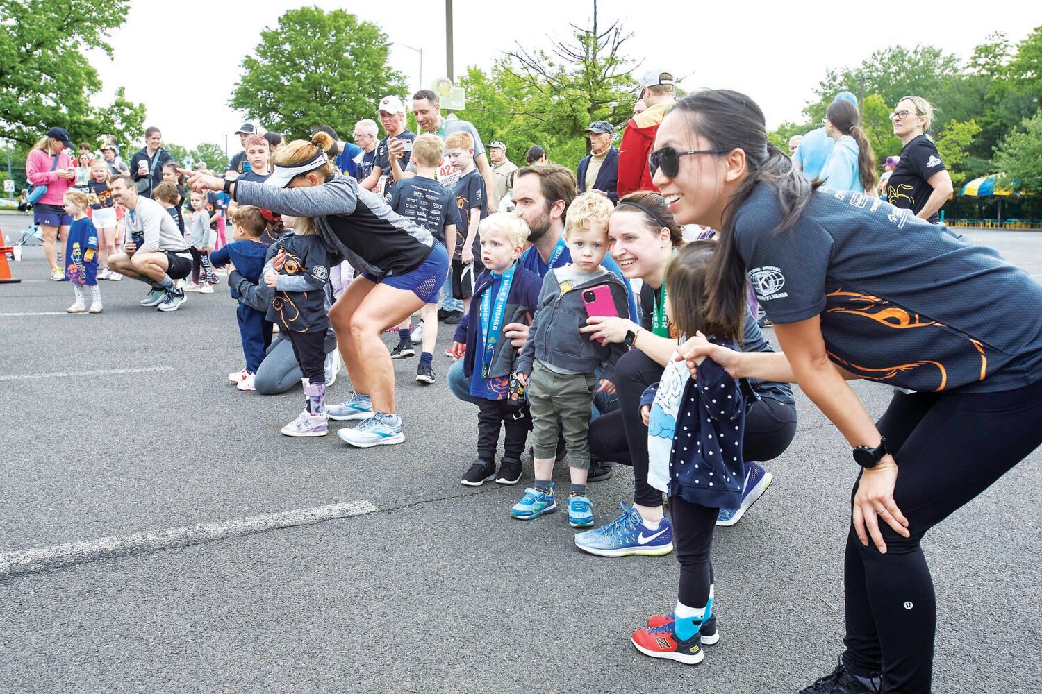 The crowd gets ready for the kids’ sprint races during the Sesame Place Classic 2024.