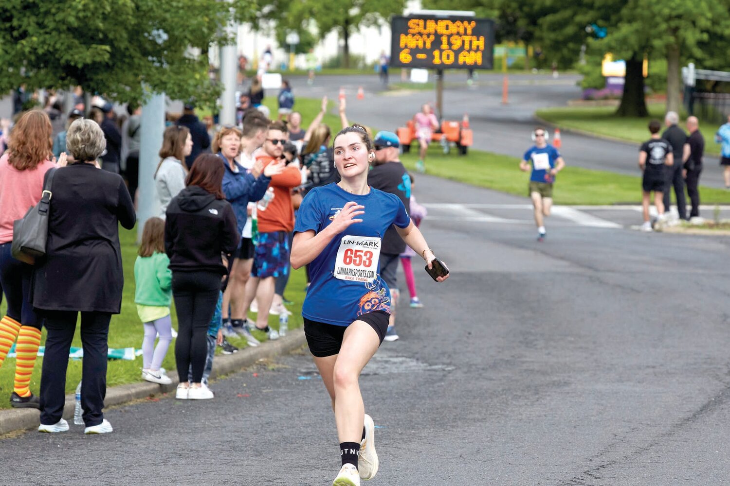 A Sesame Place Classic 5K runner on the course in Middletown Township.