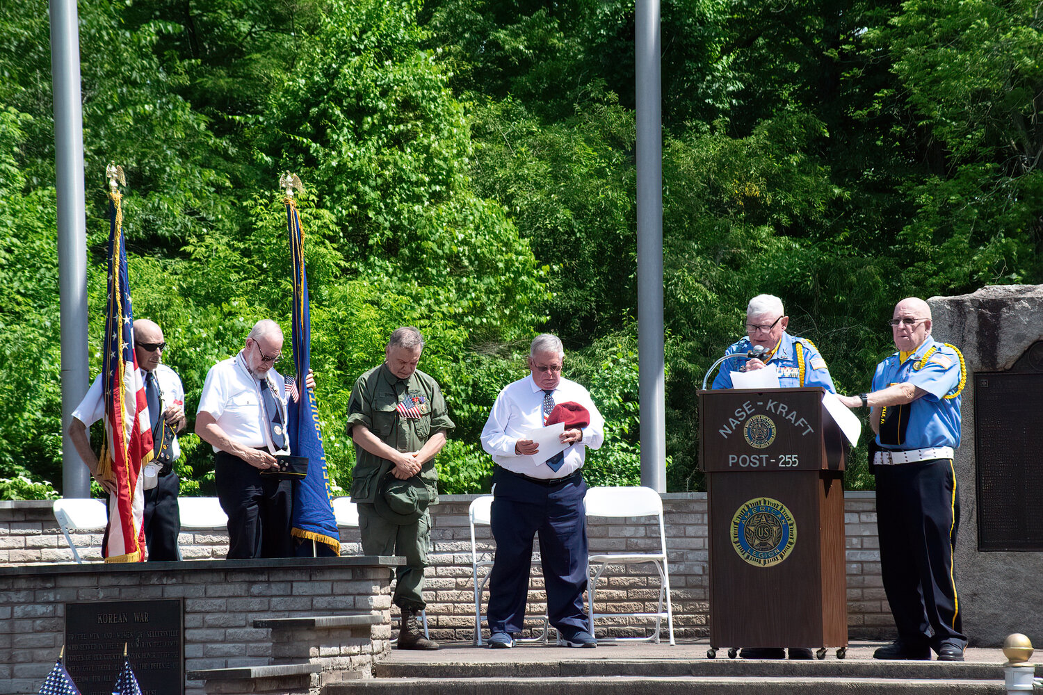 Sellersville Post 255 chaplain, Swain Fennimore, opens the service in prayer.