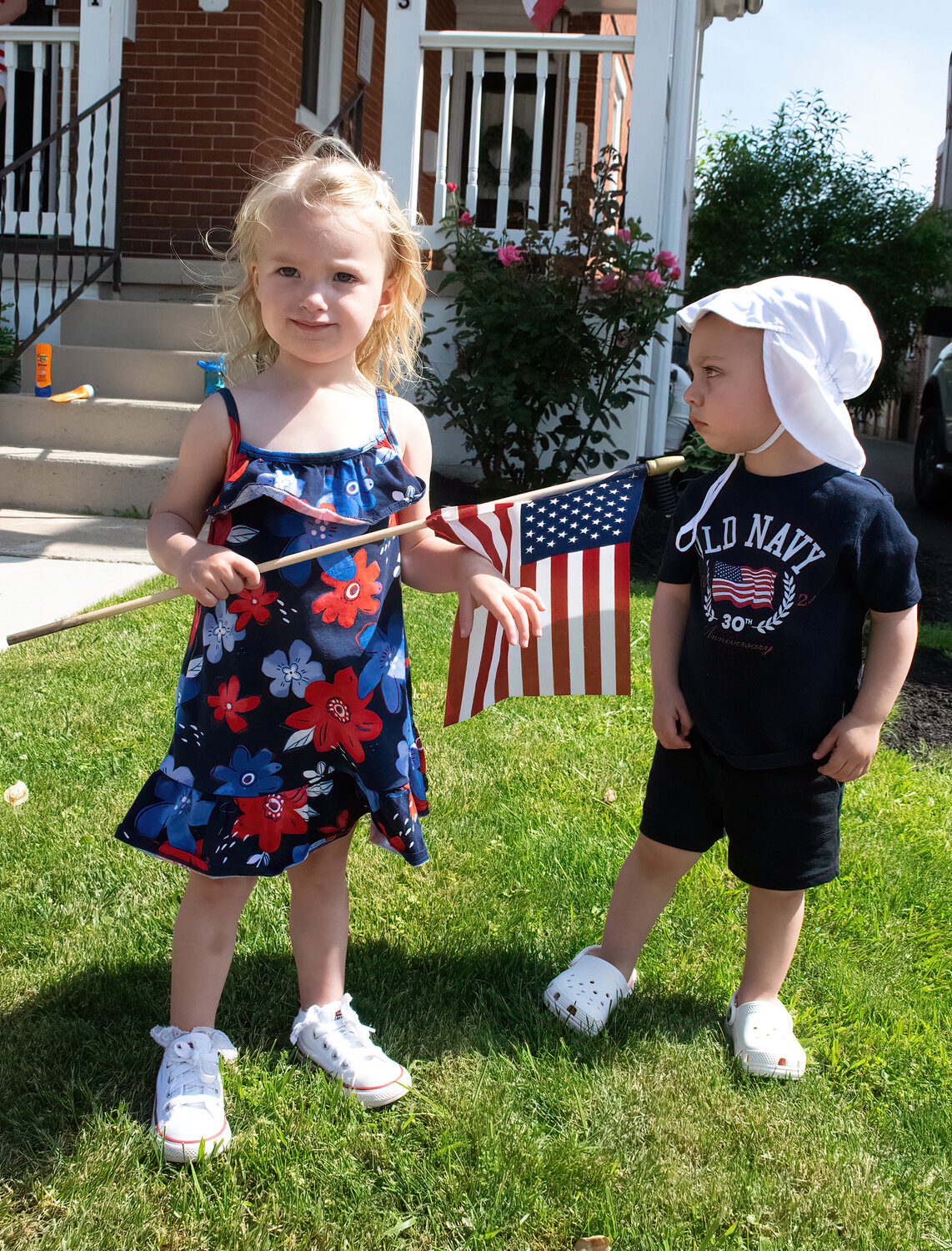 Olivia Hawkins and Henry McCrorie patiently wait for the parade to begin.