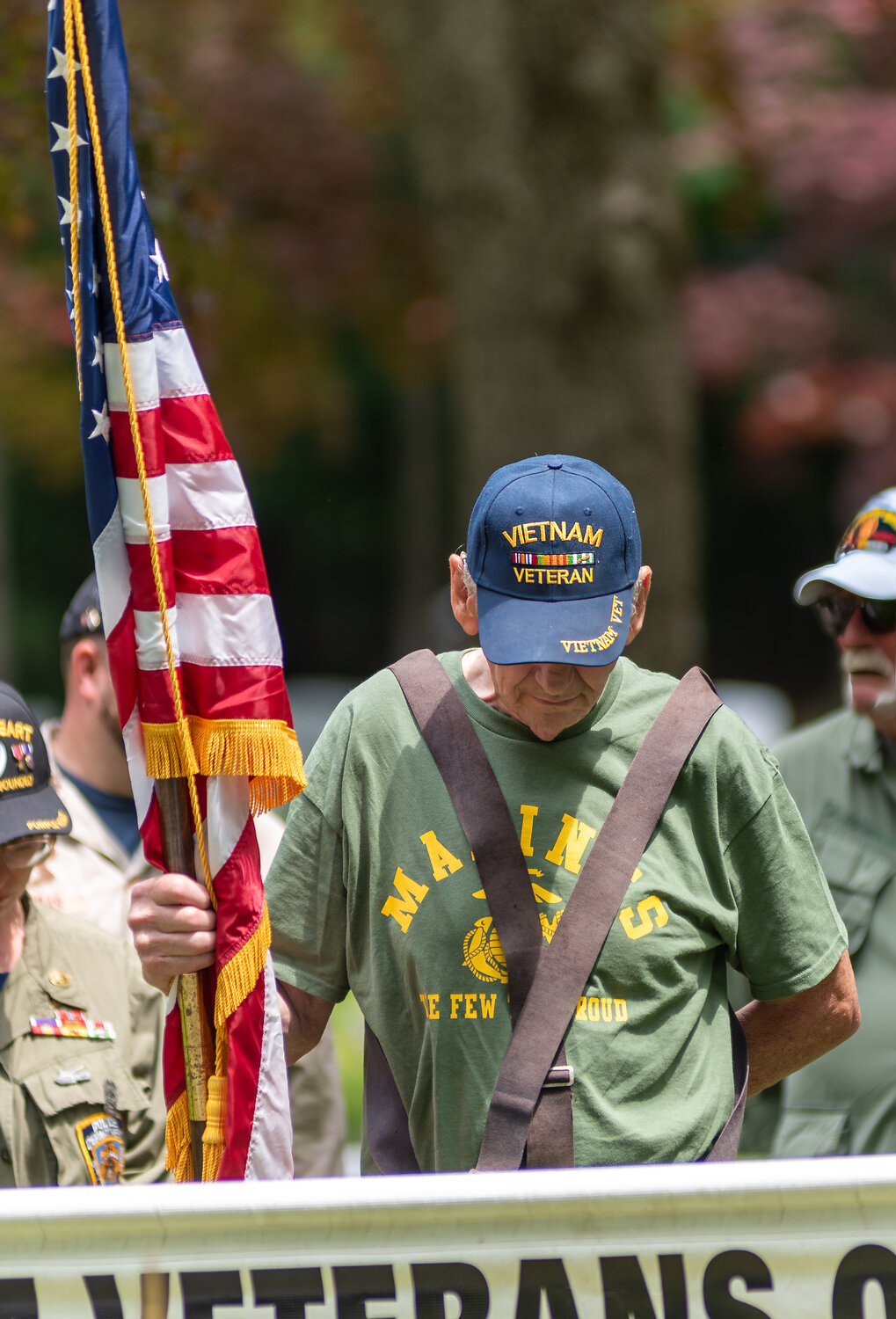 Vietnam veteran Dusty Bickford of Plumsteadville, lowers his head in quiet reflection during Monday’s ceremony to honor those who died in service to the United States.