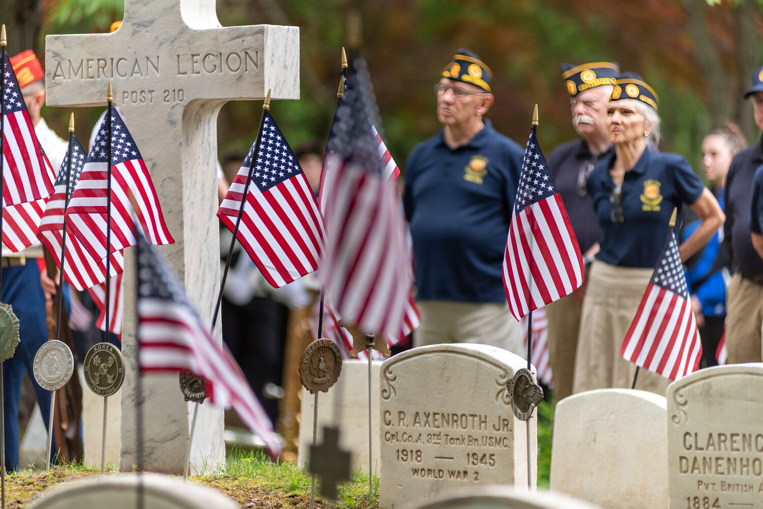 Members of local veterans groups take part in a solemn ceremony at Doylestown Cemetery on Memorial Day.