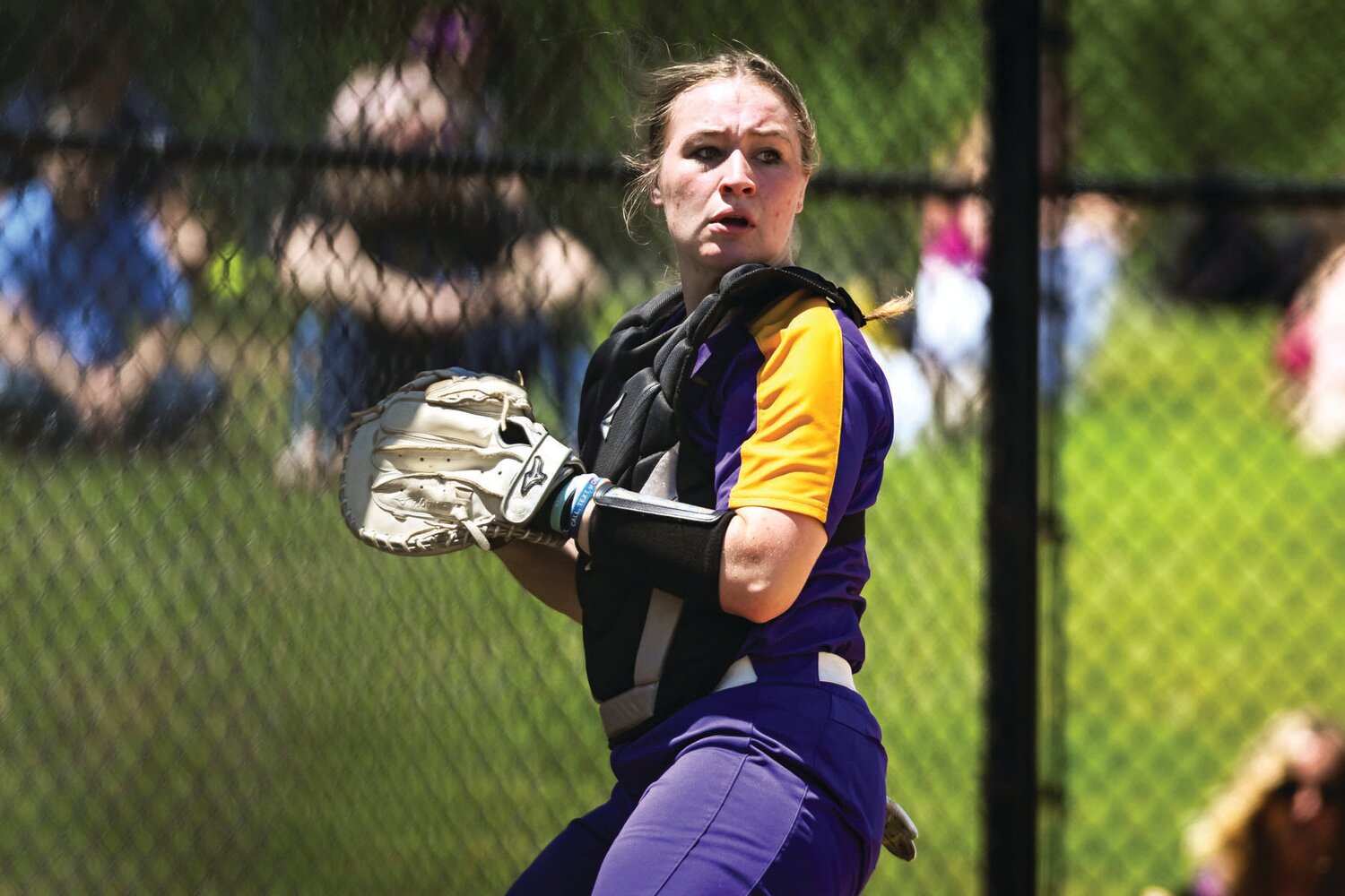 Palisades catcher Bri Hunter looks back at the runner after catching a foul popup in the first inning of Friday’s PIAA play-in game against New Hope-Solebury.