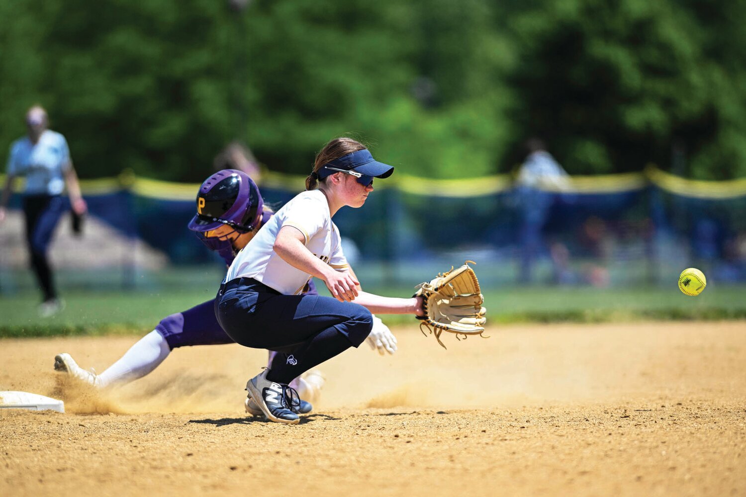 New Hope-Solebury shortstop Mabel Klossner fields a throw as Palisades’ Chesney Mosher steals second base in the fourth inning of Friday’s PIAA play-in game.