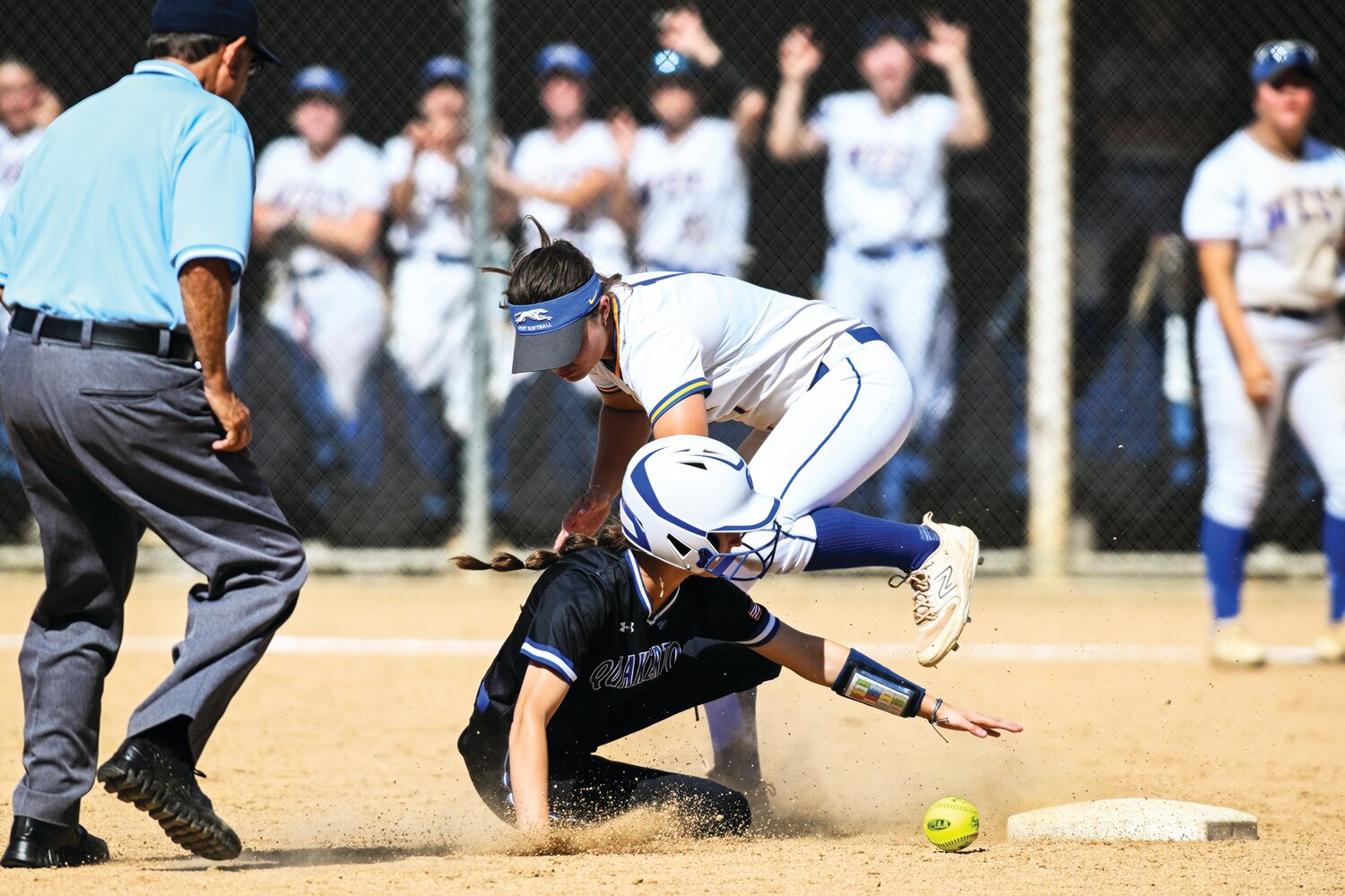 Quakertown’s Abbey Wagner reaches for the bag after stealing second in the third inning.