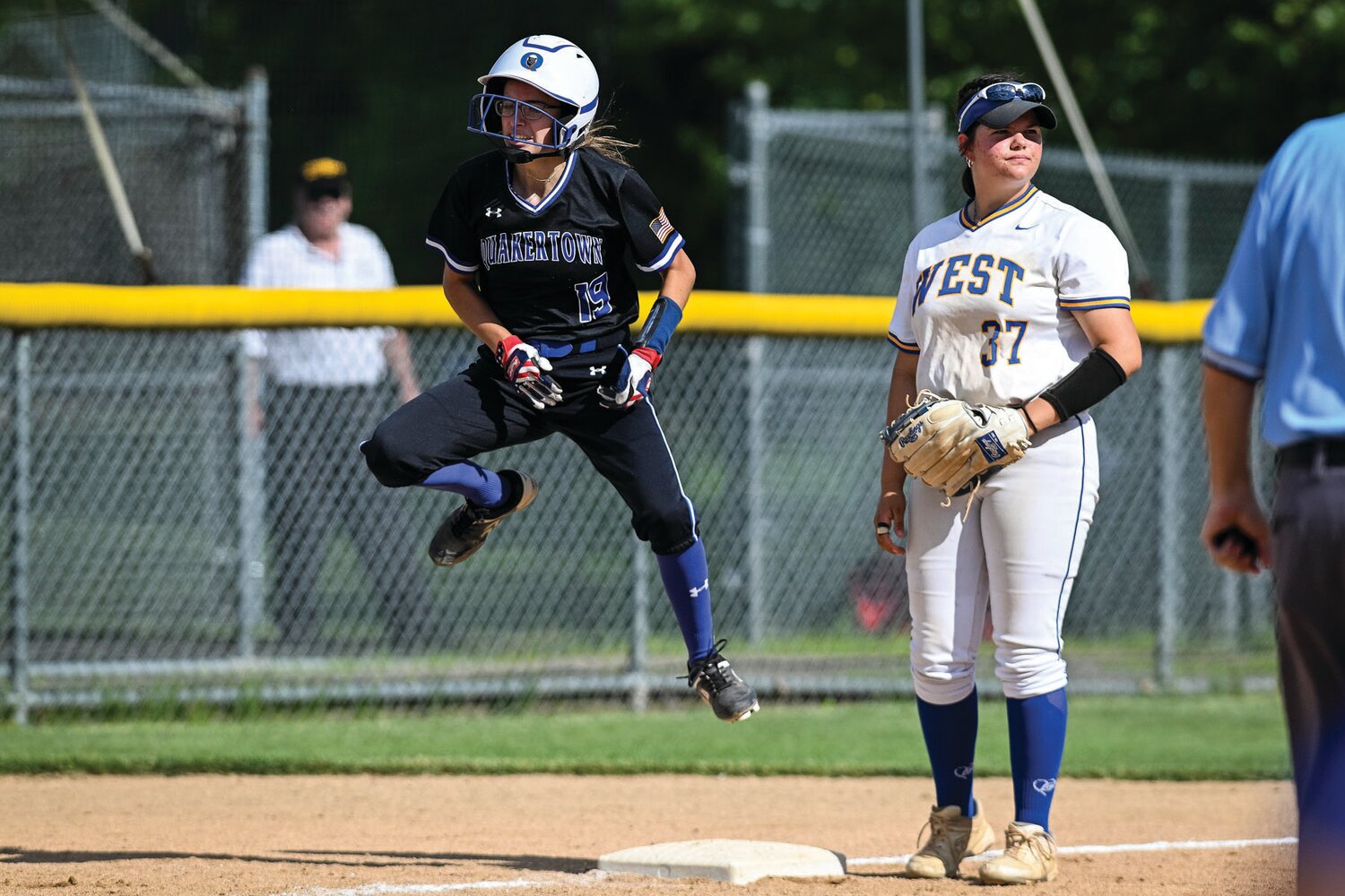 Quakertown’s Abbey Wagner jumps after tying last Thursday’s District One 6A final game at 3 apiece with a two-run triple in the fourth inning. The Panthers lost the district final to Downingtown West but bounced back Monday with a victory in the opening round of the PIAA tournament.