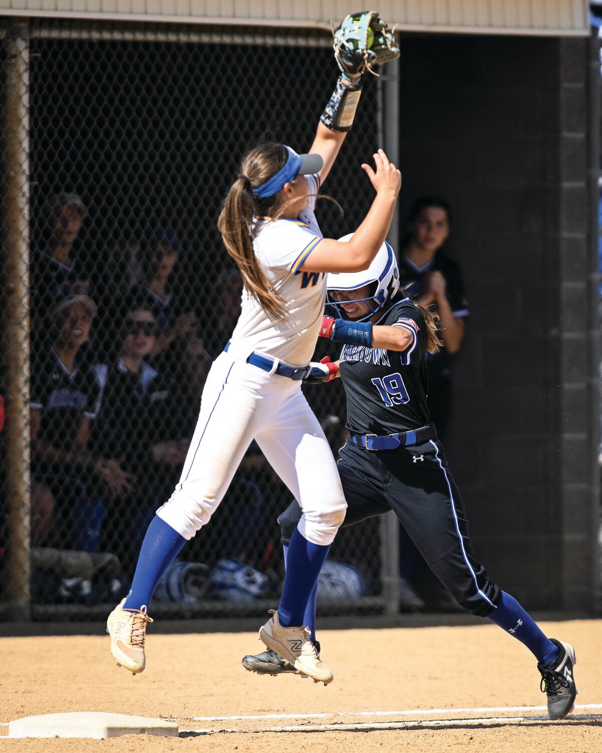 Michael A. Apice 
Quakertown’s Abbey Wagner beats out an infield hit.