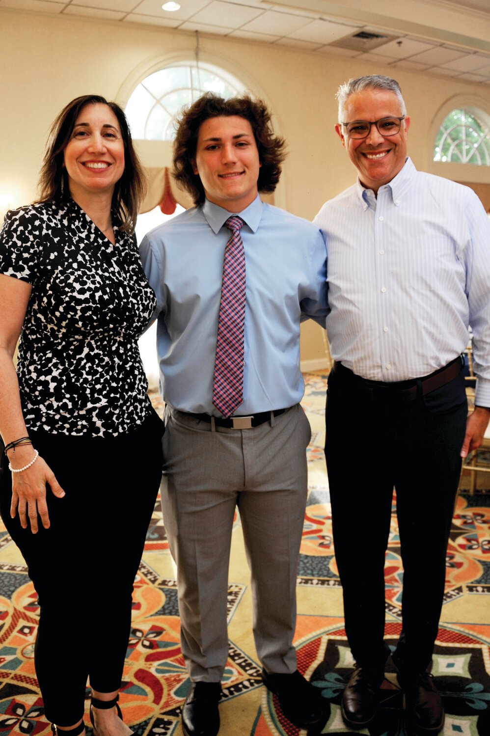 Rose Petruzzeli, Archbishop Wood student-athlete Enzo Petruzzelli and Al Petruzzeli.