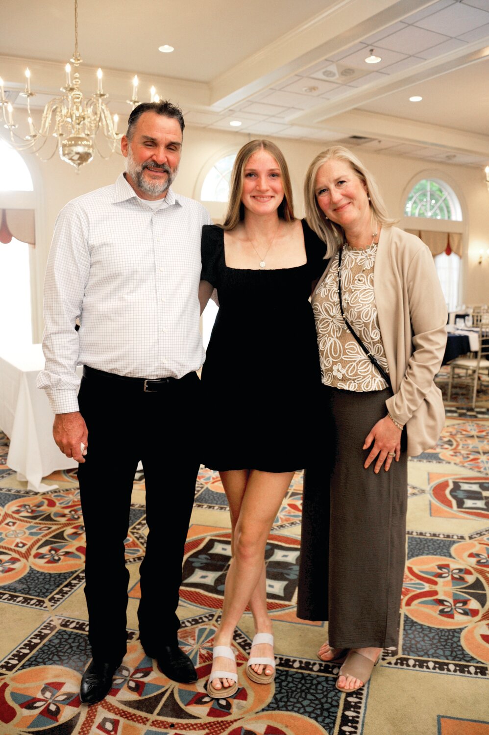 Rob Keller, Central Bucks East student-athlete Paige Keller and Amy Keller.