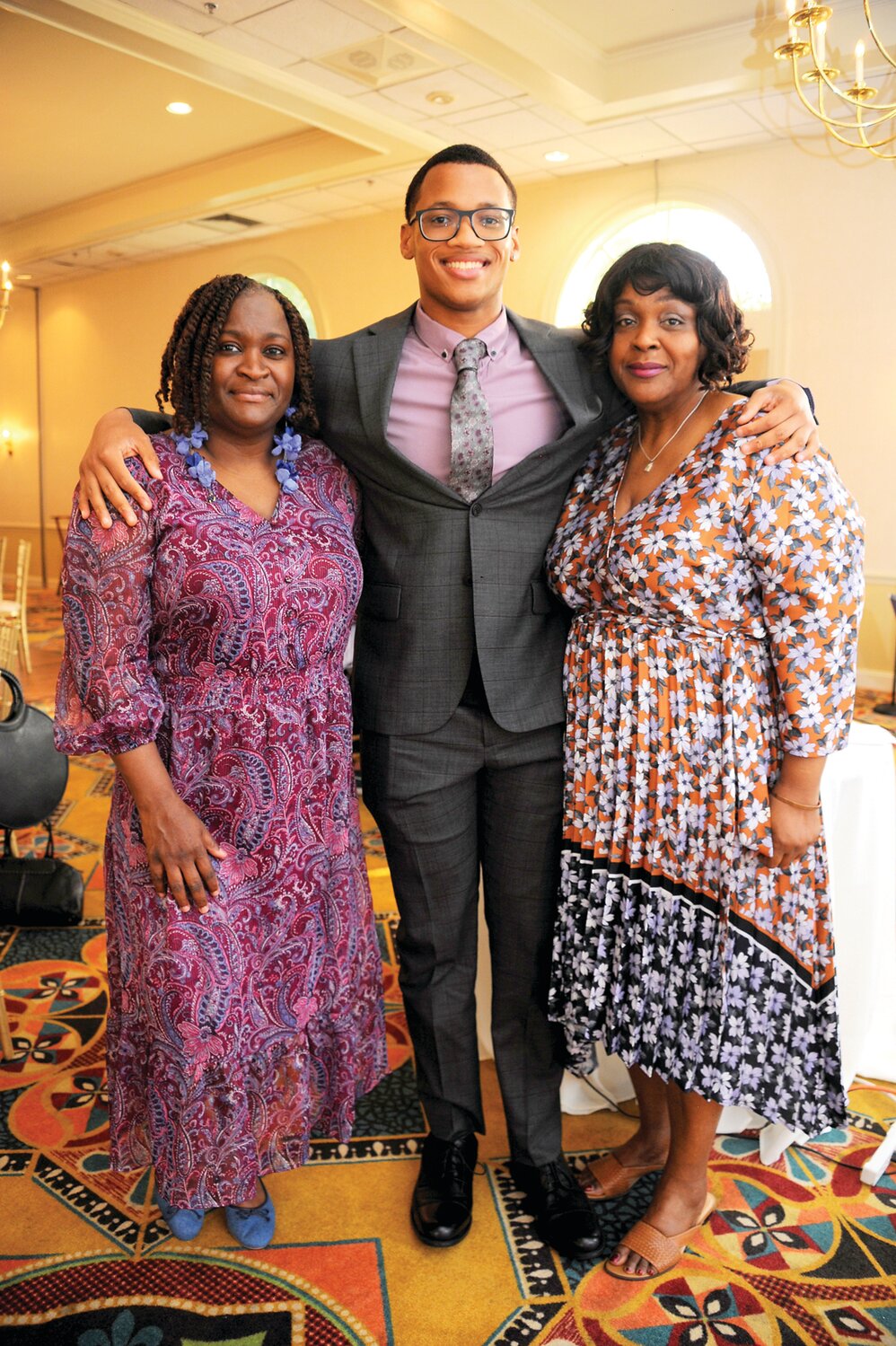 Roxanne Holmes, George School student-athlete Zachary Holmes and Annmarie Clarke.