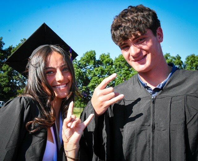 Grace Balsamo and Tyler Bonelli await the start of the Palisades High School graduation ceremony.