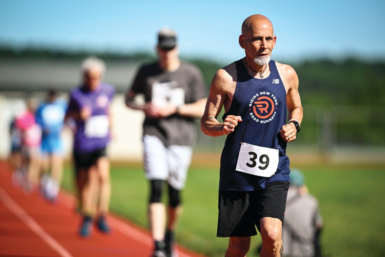 Scott Sugarman competes in the 400-meter dash.