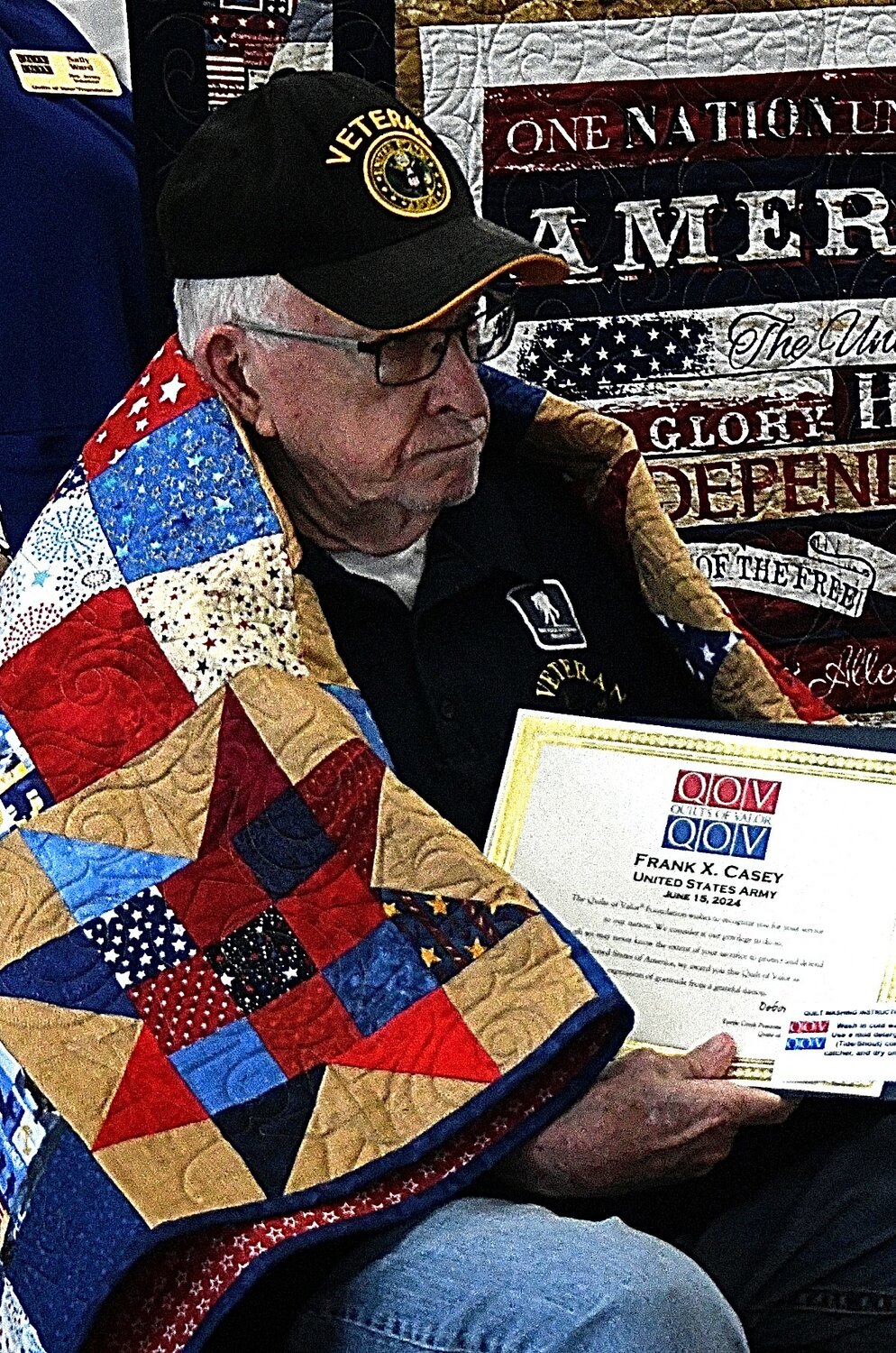 Army veteran Frank X. Casey received a quilt from the Quilts of Valor organization.