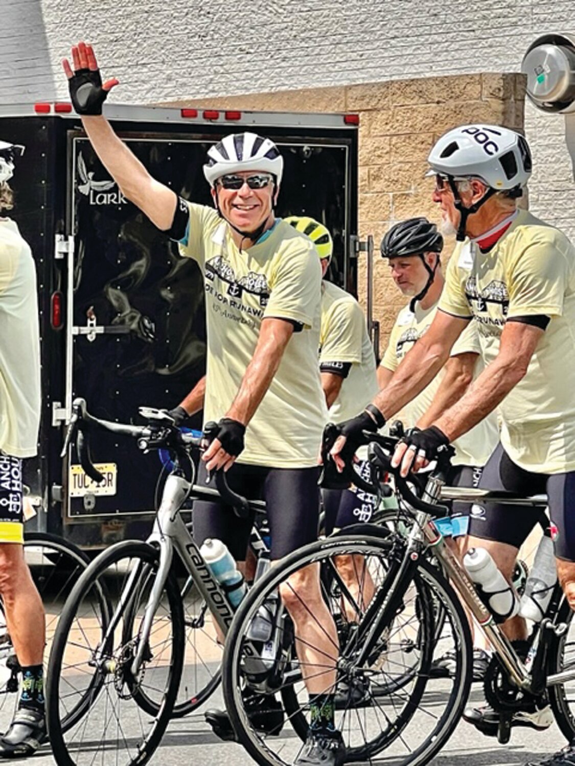 Joe Boyce gives a hearty wave after completing another five-state journey to help disenfranchised youth in the local area.