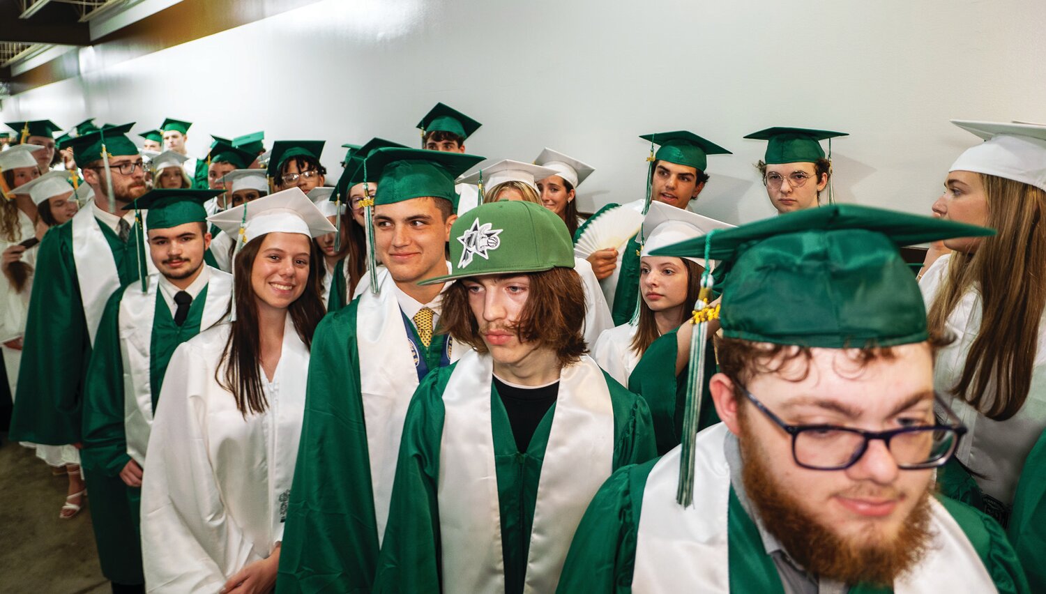 Pennridge High School seniors line up to process into Stabler Arena for graduation.