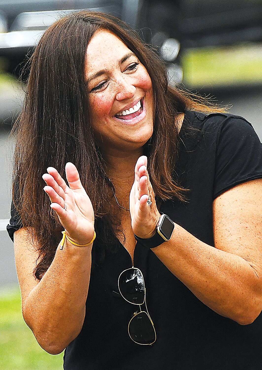 Jennifer Schorn, Bucks County district attorney, applauds at the cornhole tournament in Jamison June 29.