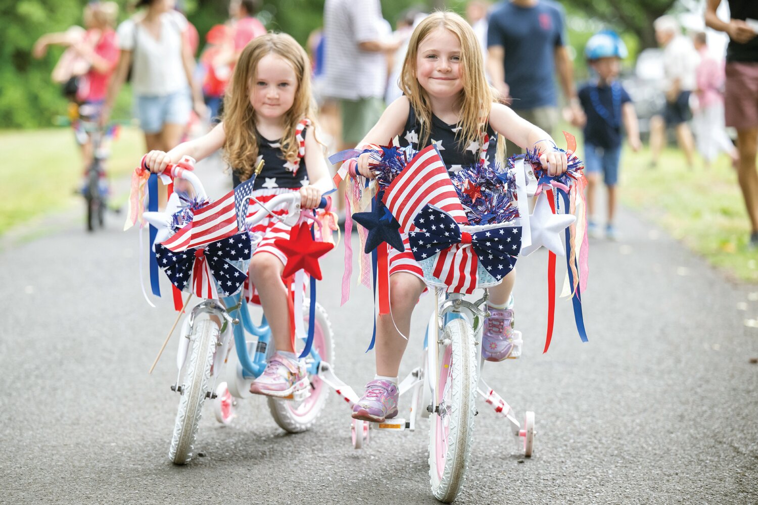 Children gear up for the decorated bike parade at Fonthill Castle.