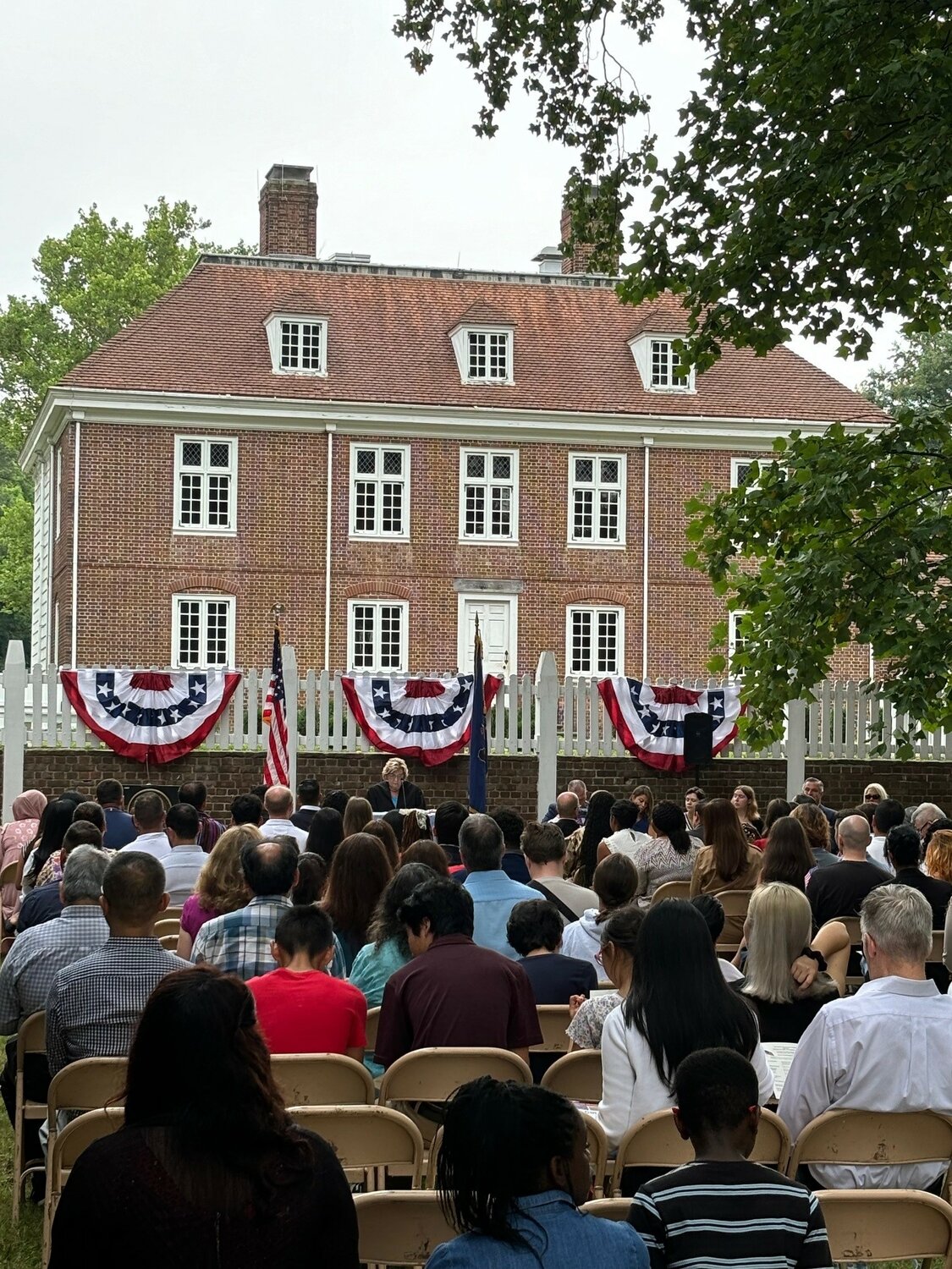 Fifty people, along with the families, became citizens of the United States on July 25 at Pennsbury Manor.