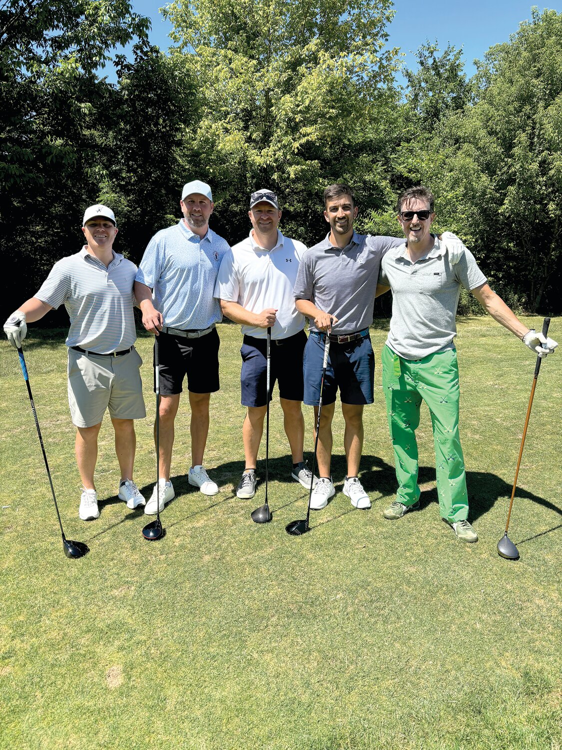 Mike Christou, owner of event sponsor Ardana Food and Drink, with Keith Fenimore and friends.