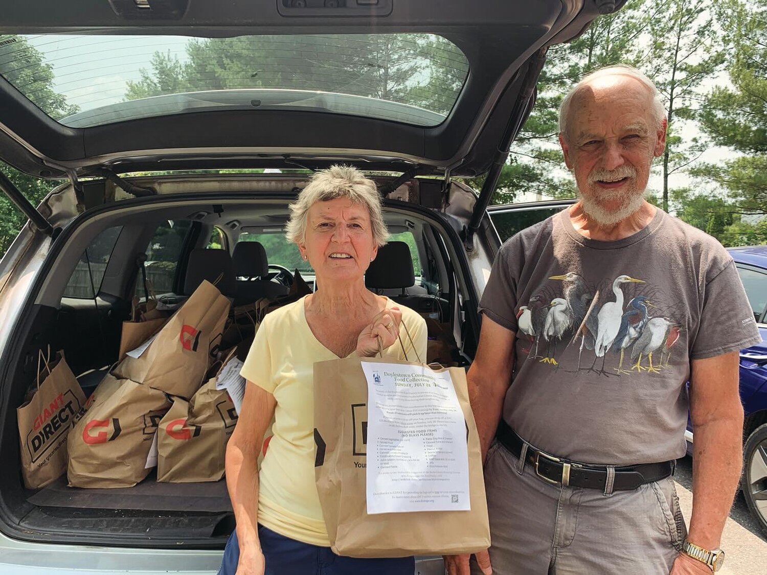 Doylestown Presbyterian Church (DPC) members Donna and Mike Line deliver food to the Bucks County Housing Group’s Doylestown Food Pantry on July 28. DPC volunteers picked up nearly 150 shopping bags filled with food by Doylestown residents during DPC’s first Community Food Collection.