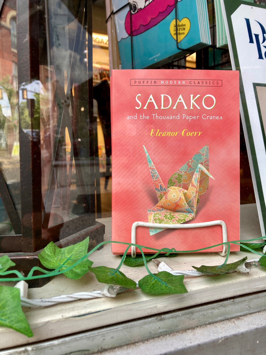 The Doylestown Bookshop featured the children’s classic “Sadako and the Thousand Paper Cranes” in the window of the shop on the anniversary of the bombing of Hiroshima.