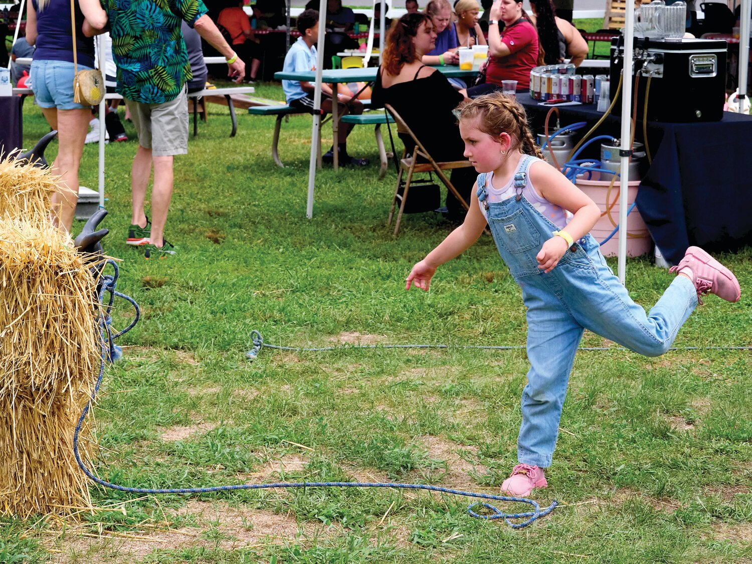 Harper Salsbery of Cheltenham demonstrates her roping skills during the Sweet Corn Festival Aug. 4 at Charlann Farms in Lower Makefield.