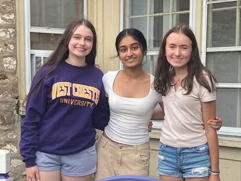 Hands that Feed team members, from left, Keira Sandusky, volunteer, Esha Gadi, founder, Ashlyn Bradley, social media manager.