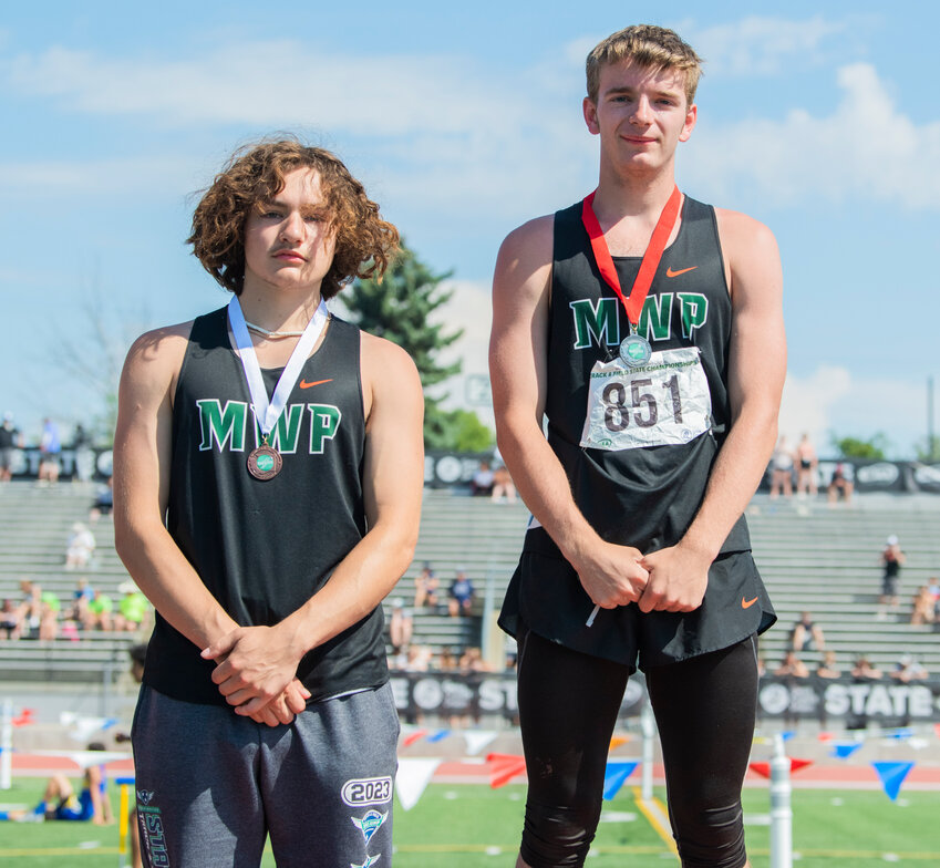 Morton-White Pass runner Max Lowe and Tony Belgiorno stand on the podium at Zaepfel Stadium after taking fourth and second in the 2B boys long jump event in Yakima on Saturday, May 27.