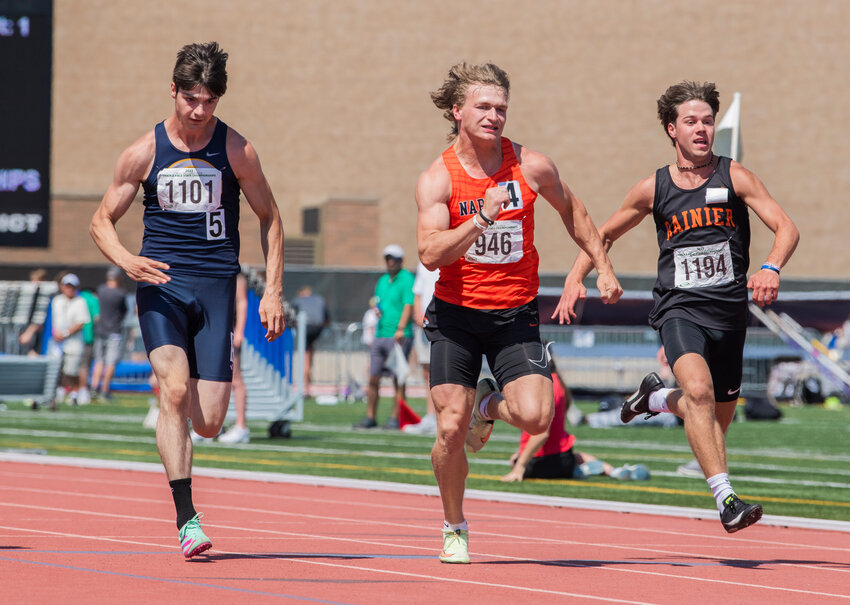 Napavine’s Max O’Neill came up just thousandths of a second short of first place in the 2B Boys 100 meter dash while running alongside Rainier’s Josh Meldrum Saturday, May 27.