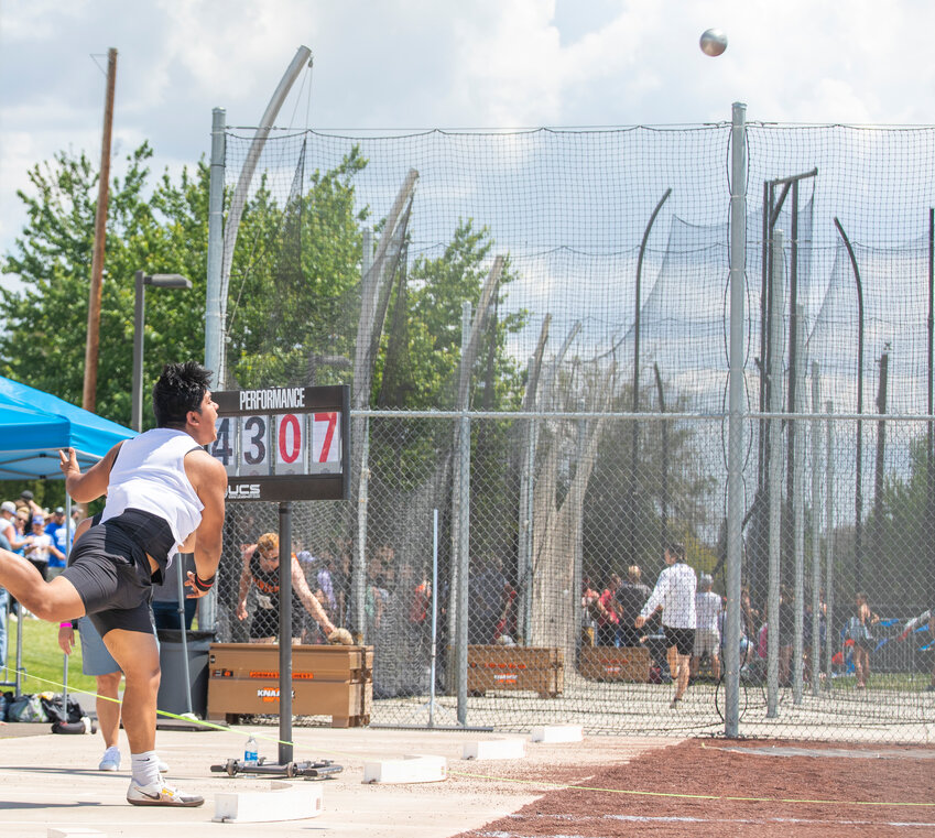 Tenino’s Andres Zamudio competes in the 1A boys shot put finals at the State track and field meet in Yakima on Friday, May 26.