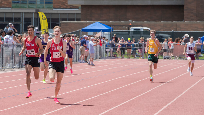 Toledo’s Jordan McKenzie and Conner Olmstead compete in a 400 meter dash prelim in Yakima on Friday, May 26.