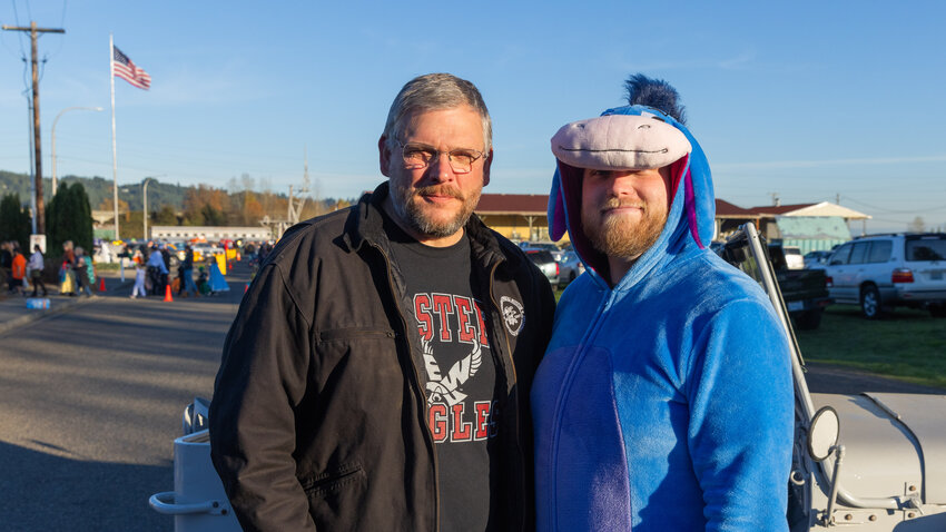 Executive Director Chip Duncan, left, and Jesse Lloyd, director of Veterans Journey Forward, pose for a photo during a Trunks with Treats event at the Veterans Memorial Museum on Sunday, Oct. 29, 2023.