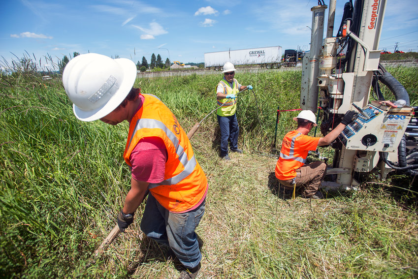 Workers from Holt Services and Veronix Labs remove pieces of a probing drill as they bore upwards of 45 feet into the ground along Berwick Creek and Hamilton Road south of Chehalis on in 2020. The companies were sub-contracted by the U.S. Environmental Protection Agency to sample soil and groundwater at the Hamilton Road Impacted Area which is part of the EPA's Hamilton/Labree Superfund Site. The EPA hopes to find the worst contamination in the area's soil so they can focus on the best ways to proceed with cleanup of the area.