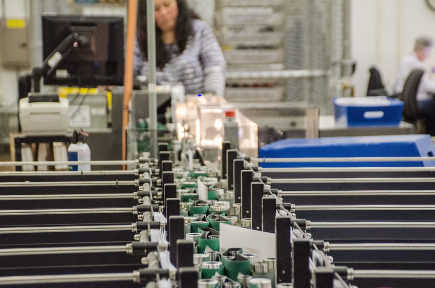 A machine sorts ballots for the presidential primary at Thurston County&rsquo;s ballot processing center in this Chronicle file photo.