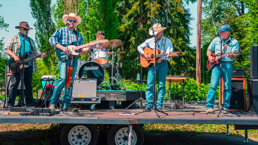 FILE PHOTO &mdash;&nbsp;Pat Murphy and the Straightshot Band with special guest Chris Guenther perform outside the Adna Burger Bar during a &ldquo;Back The Blue&rdquo; event in 2021