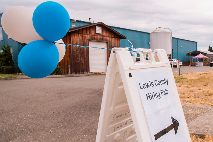 FILE PHOTO &mdash; Balloons blow in the wind during a Lewis County Hiring Fair at Dick's Brewing in Centralia in 2021. This year's event will be held at the Centralia Outlet Mall. The event will be held at 2000 Haviland St.off of I-5 Exit 82 in the former Dress Barn location.