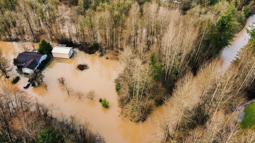 School Land Road and nearby properties are seen inundated as major flooding continues on the Chehalis River in early January 2022 in Rochester.